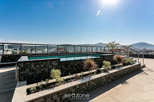 Ingleses Centro Apartment | Complete stay in a building with pool 850m from the beach in Florianópolis - STIs