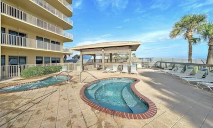 Thomas Drive Condo | Completely renovated, huge balcony ocean front condo/beach chairs + umbrella!