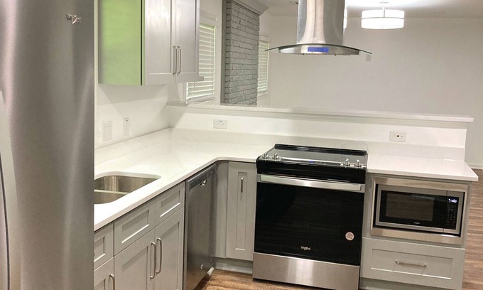 Lakewood House | Completely Remodeled All Brick Ranch with 1.1 Acres on Buford Drive! n
