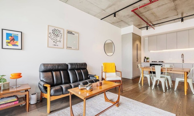 Brunswick Apartment | Concrete Junction Sunny Industrial Balcony Haven