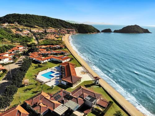 Praia Rasa House | Condomínio beira mar - 2 suíte - 1quarto - Lazer - AC