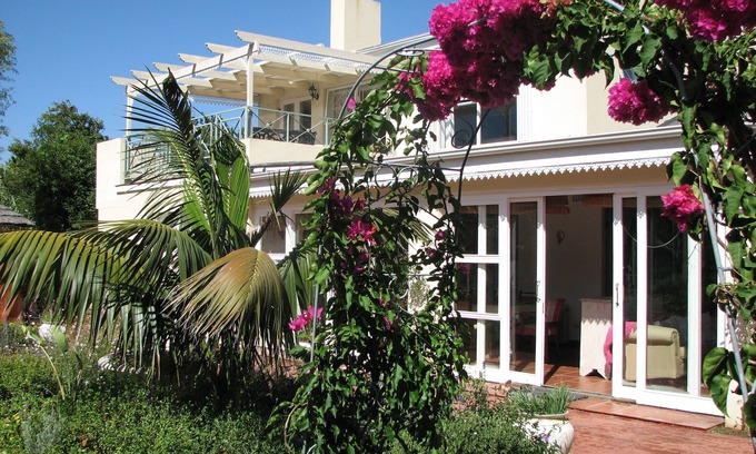 Constantia Cottage | Constantia Lazy River, Froggs Leap studio for 2 people and 2 small kids on sofa
