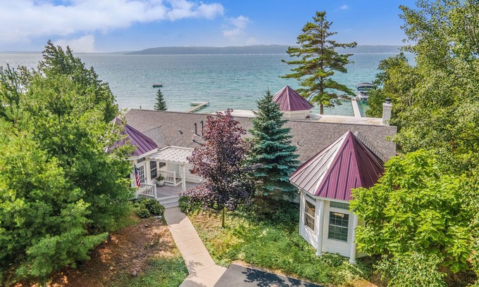 Lake Township Cottage | Contemporary Crystal Lake Beachfront Cottage