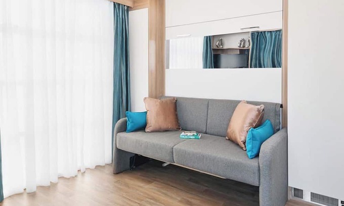 Caerwys Cottage | Contemporary mini pod with one double pull-out bed and en suite shower and W.