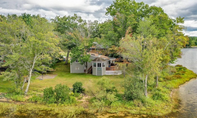 Lochmere House | Contemporary pet-friendly waterfront home on Silver Lake with lovely sunroom