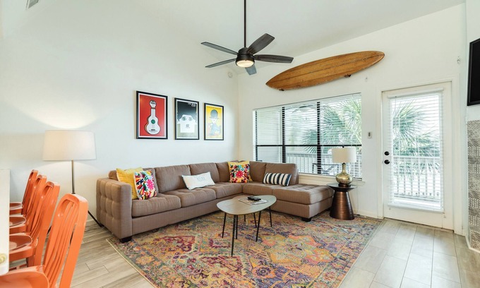 Pirates Cove House | Contemporary Townhome w/Bay View - Cozy Living Area & Gorgeous Sunsets