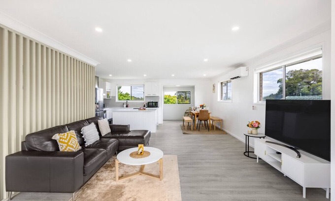 Robertson House | Convenient Comfort: 4BR near Malls and Transport!