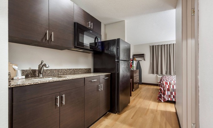 Council Bluffs Hotel | Convenient Stay, Superb Location! 2 Budget-friendly Units with Kitchenettes