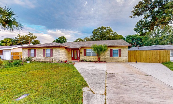 Orient Park House | Conveniently located home with private pool, patio, foosball, & private W/D