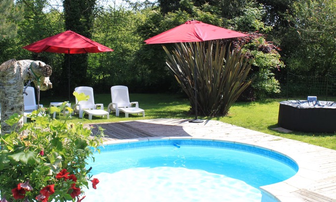 Bourbriac Cottage | Converted Breton stone barn with heated pool in lovely setting