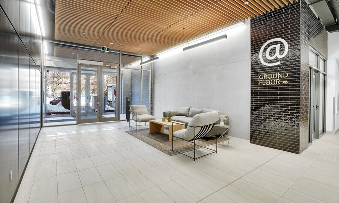 Wellington Village Apartment | Corporate Stays - Modern 1BR Loft with Spacious Layout and Style
