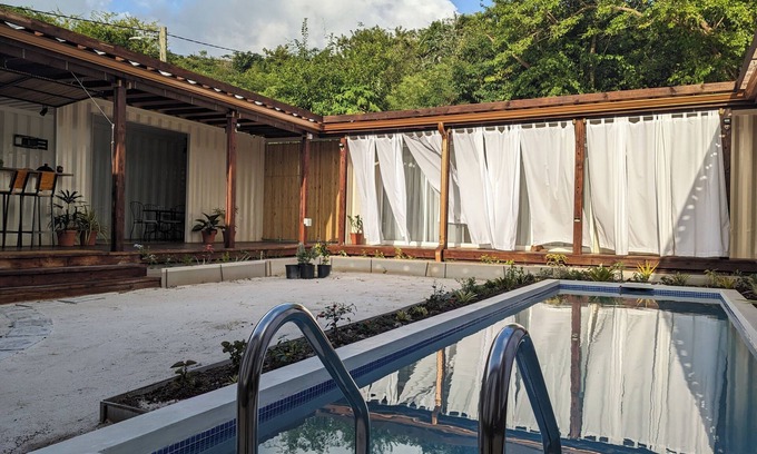 Calivigny House | Corten Villa ● A Vacation within Your Vacation