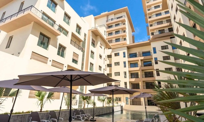 Ain Harrouda Apartment | Cosy apartment, swimming pool, near the sea, family, couple Zenata Casablanca
