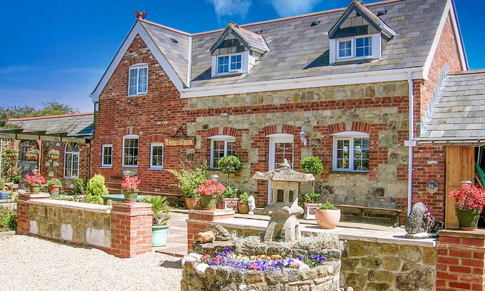 Merstone Cottage | Cosy converted barn in rural location with views of the surrounding countryside.