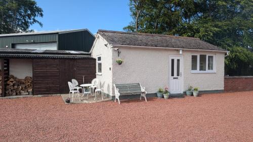 Wollerton House | Cosy Coppice Cottage