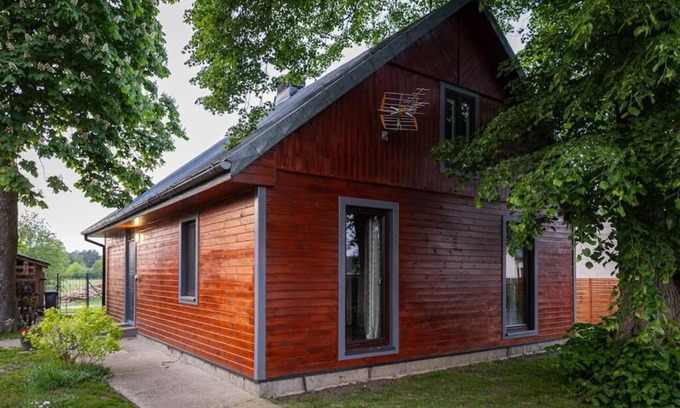 Zatory House | Cosy country house surrounded by a river, forests and meadows.
