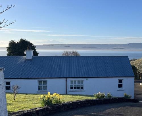 Greencastle House | Cosy Donegal Cottage with Panoramic Sea Views