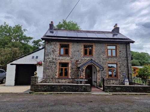 Llanwrda House | Cosy Riverside home