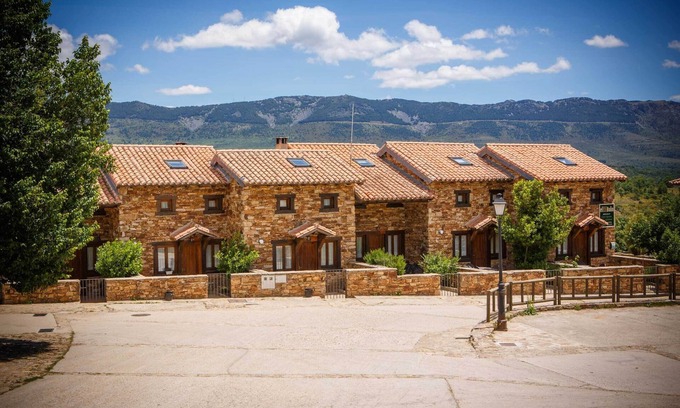 Horcajuelo de la Sierra Ski Chalet | Cottage with wooden ceilings and beams Dormer bedroom and French Fireplace in the Salon