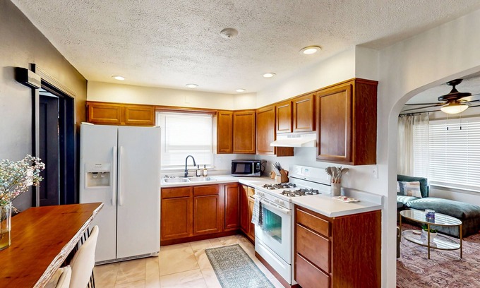 Indianapolis House | Cottage with front porch, fenced yard, washer/dryer, & AC - convenient location