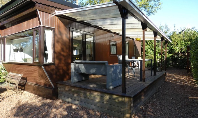 Marum Ski Chalet | Cottage with veranda for rent against forest edge, ideal for peace seekers