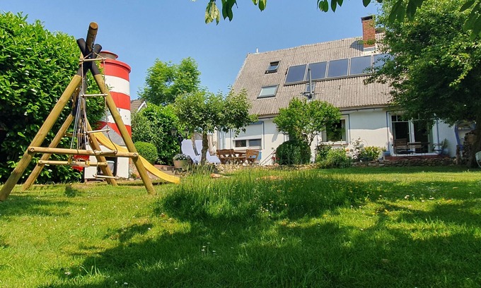 Neuenkirchen House | Country-style vacation home on the banks of the river Medem for up to 9 people.