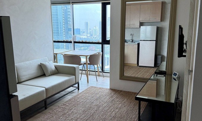 Wack-Wack Greenhills Condo | Cozy 1-BDR condo with AC, Hot Water, and WiFi in Brgy Wack-Wack Greenhills