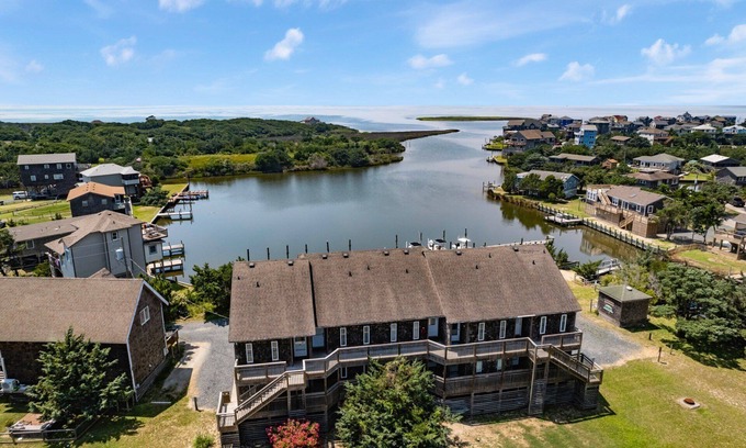 Avon Condo | Cozy 1BR Soundfront Condo | King Bed & Sunset Views