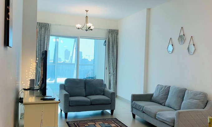 Al Majaz Apartment | Cozy 2-bedroom apartment in superb Sharjah corniche with WiFi, fitness room pool