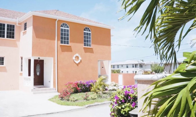 Green Garden House | Cozy 2-bedroom townhome in enchanting Atlantic Shores with Wi-Fi, AC, and more.