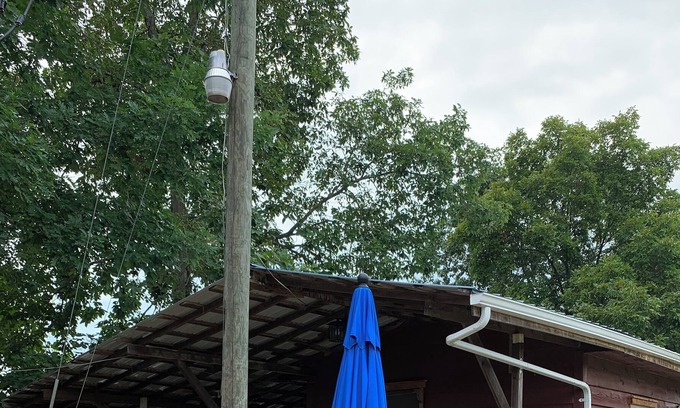Cottageville Cabin | Cozy 2-bedroom cabin with view of Millcreek in and a private dock.