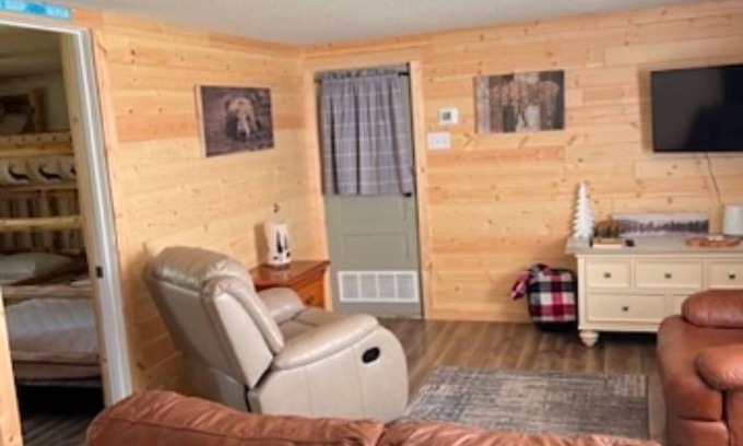 Rudyard Cabin | Cozy 2-bedroom cabin near endless trails. Family and pet friendly. Fire pit & AC