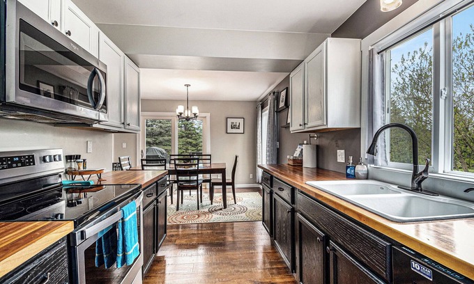 Boyne Falls House | Cozy 3BR Home: Private Hot Tub and Dog-Friendly.