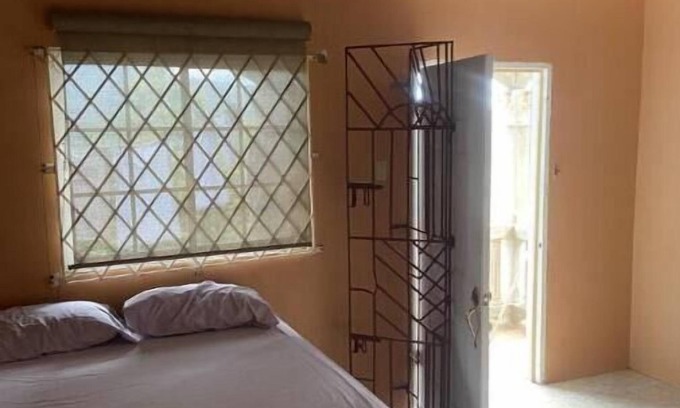 Mandeville House | Cozy accommodation in the cool hills of ,Mandeville with a view of the ocean