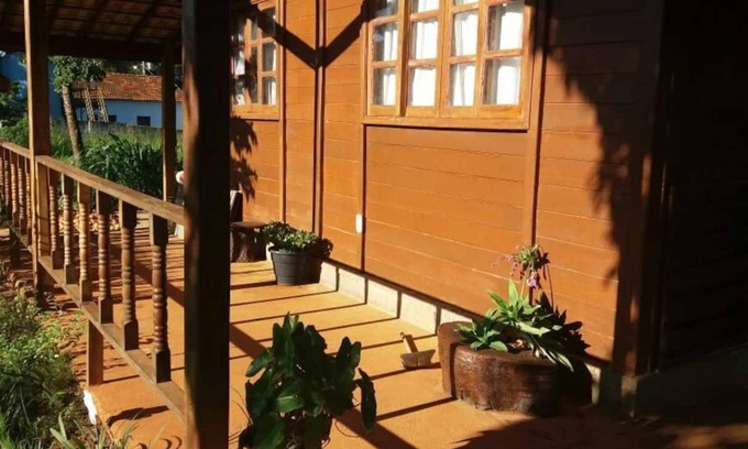 Morada Nova de Minas House | Cozy and Charming Wooden House With Wood Stove and Fishing Pond