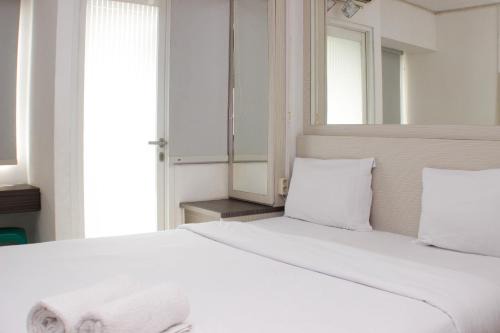 Karawang Apartment | Cozy and Warm Studio at Grand Sentraland Karawang Apartment By Travelio