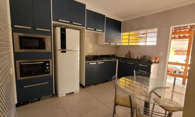 Campinas House | Cozy farmhouse in Campinas with games tables and church-style hall.