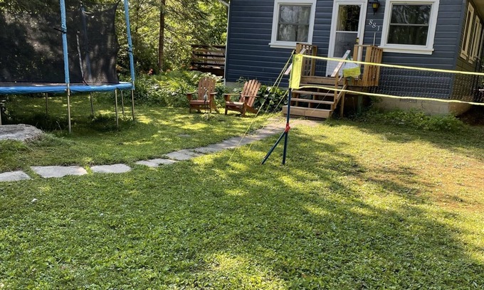 Alcona Cottage | Cozy cabin retreat steps to sandy, shallow beach