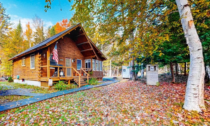 Beaver Cove House | Cozy cabin with covered porch, firepit, grill, fireplace, & washer/dryer