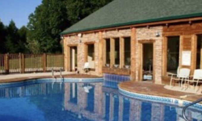 Spencer Cabin | Cozy cabin with fire pit, hot tub, and pool, and a swing set in the backyard!