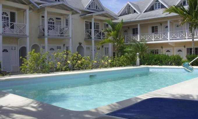 Stewart Town Apartment | Cozy Caribbean Paradise Getaway with Pool. Come for the Sea, Sand and Sun