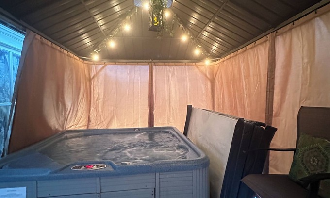 Cheboygan House | Cozy Chic of Cheboygan: Private Main Level - Hot Tub, Tanning & Massage Chair!