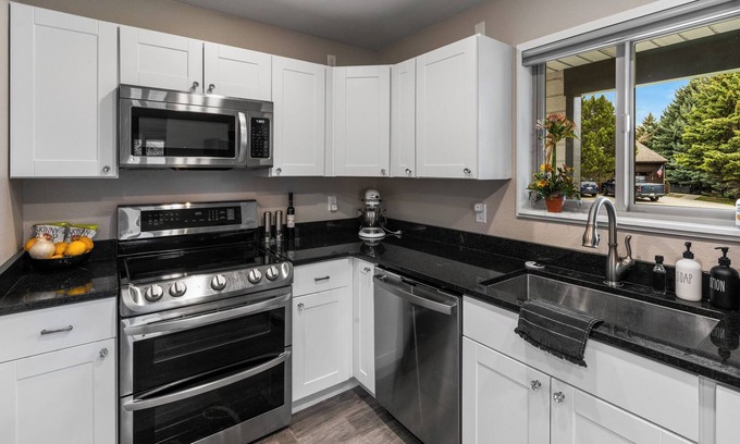 Bozeman Condo | Cozy Chic: Updated Retreat - Pet Friendly - Hot Tub