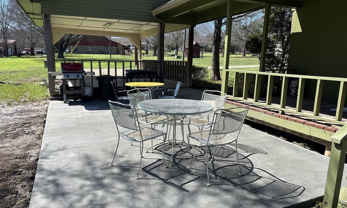 Rosston Cottage | Cozy cottage nestled next to Hart's Creek, surrounded by trees and wildlife.