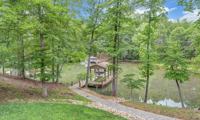 Moneta House | Cozy Cove- Fenced yard for your dog and calm waters to swim for the family