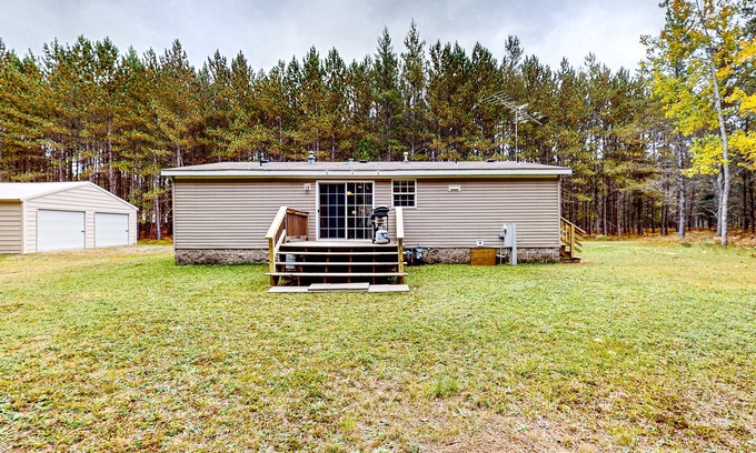 Conover House | Cozy, dog-friendly home with on-site snowmobile/ATV trails & firepit