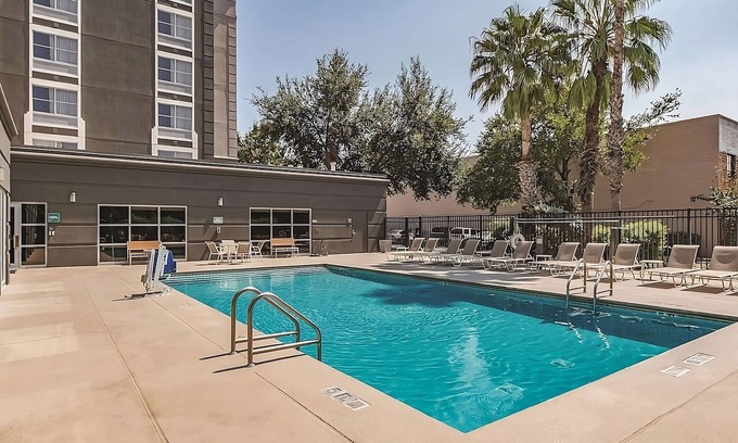 Arsenal Hotel | Cozy Downtown Retreat - Steps from The Alamo & River Walk Adventures