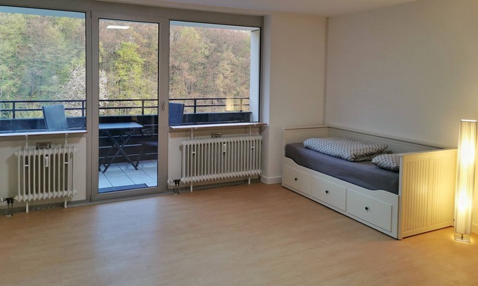 Buseck Apartment | Cozy holiday apartment with a view of the forest and a balcony in Gießen-Buseck