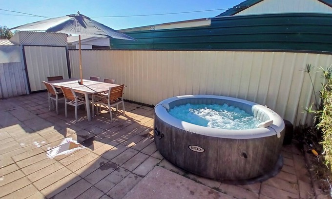 Whyalla Stuart House | Cozy industrial home with hot tub & fruit garden