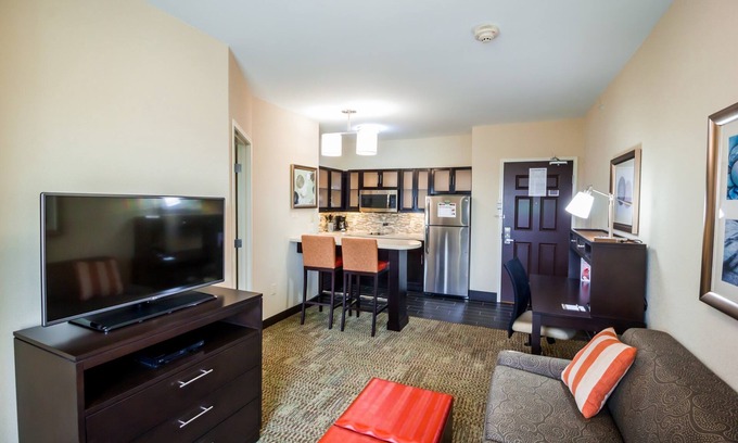 Plano Condo | Cozy King Suite | Seasonal Outdoor Pool, 24-Hour Business Center and Fitness Center